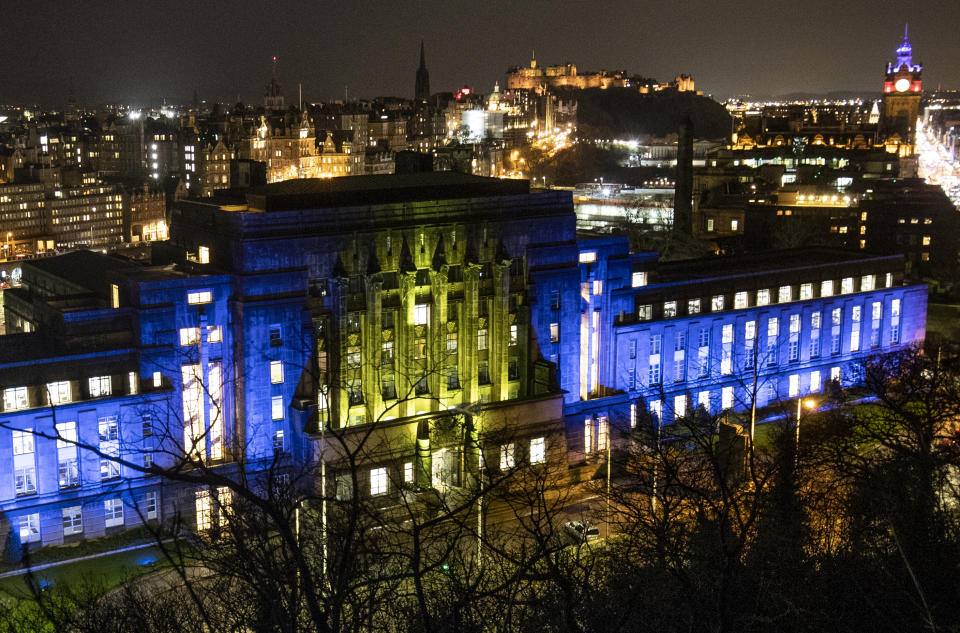 St Andrew's House, a Scottish Government building in Edinburgh, is illuminated in blue and yellow, the colours of the European flag, ahead of the UK leaving the European Union at 11pm on Friday.