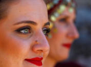 A woman looks on as she takes part in a traditional wedding ceremony in the village of Galicnik, west of capital Skopje, Macedonia July 15, 2018. REUTERS/Ognen Teofilovski