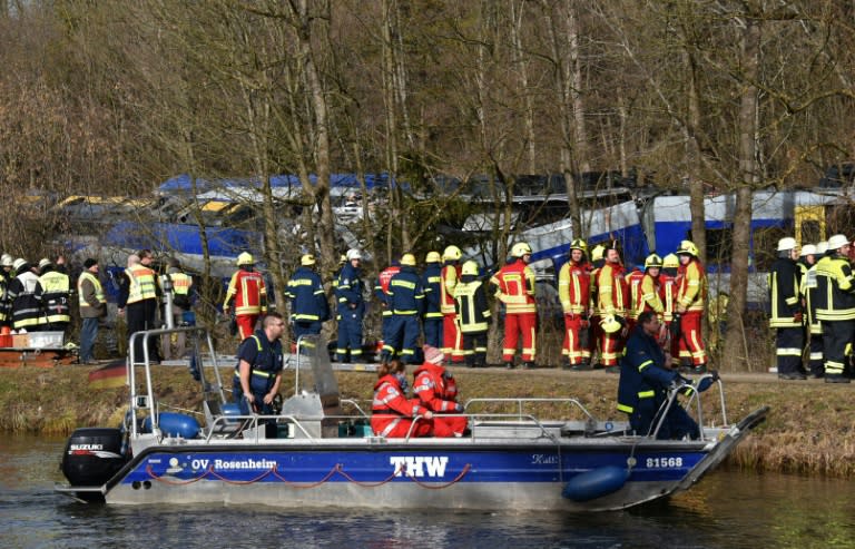 Rescuers and emergency doctors gather at the site of a train accident near Bad Aibling, southern Germany, on February 9, 2016