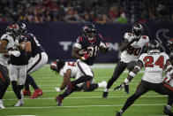 Houston Texans running back David Johnson (31) runs for a gain against the Tampa Bay Buccaneers during the first half of an NFL preseason football game Saturday, Aug. 28, 2021, in Houston. (AP Photo/Justin Rex)