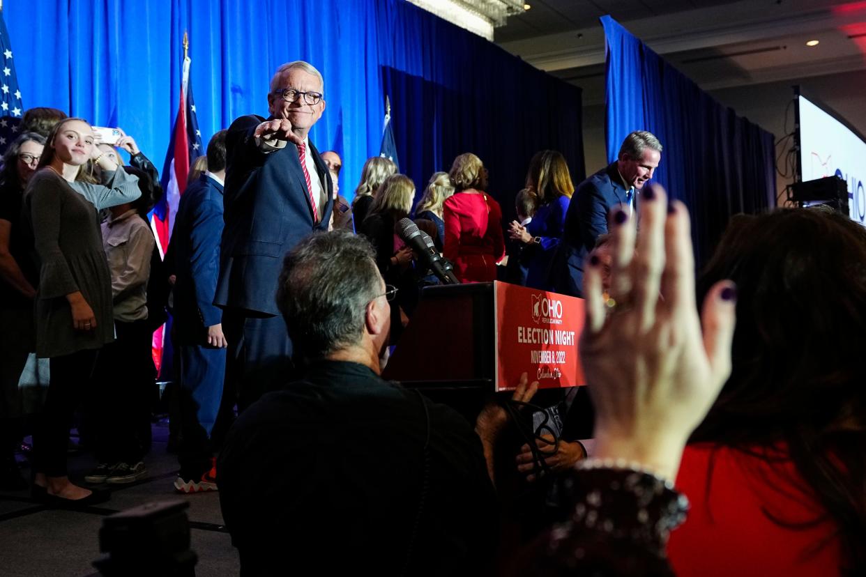 After being reelected, Gov. Mike DeWine waves to supporters during an election night party for Republican candidates for statewide offices at the Renaissance Hotel in downtown Columbus.