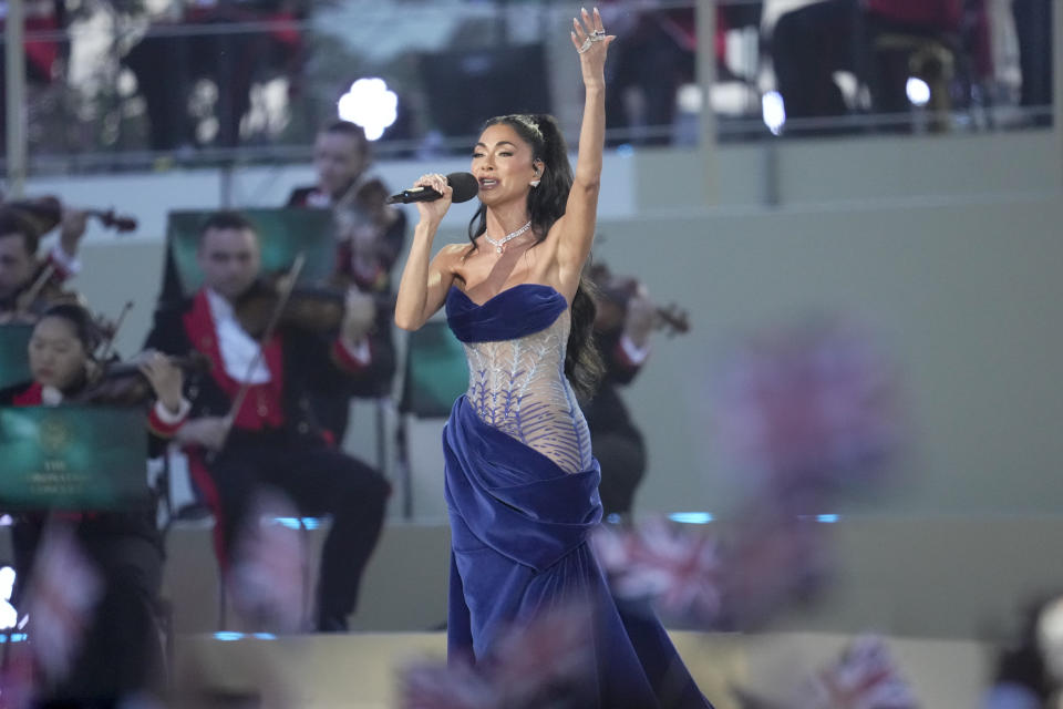 Nicole Scherzinger performs during a concert at Windsor Castle in Windsor, England, Sunday, May 7, 2023, celebrating the coronation of King Charles III. It's one of several events over a three-day weekend of celebrations. (AP Photo/Kin Cheung, Pool)