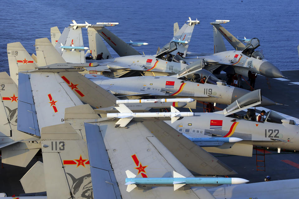 J15 fighter jets on China&#39;s sole operational aircraft carrier, the Liaoning, during a drill at sea. Source: AFP