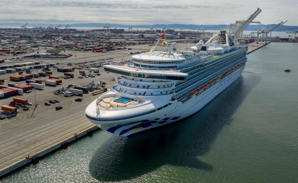 The Grand Princess docks at the Port of Oakland in Oakland, Calif., on March 9, 2020. The cruise ship, which had maintained a holding pattern off the coast for days, is carrying multiple people who tested positive for COVID-19, a disease caused by the new coronavirus. 