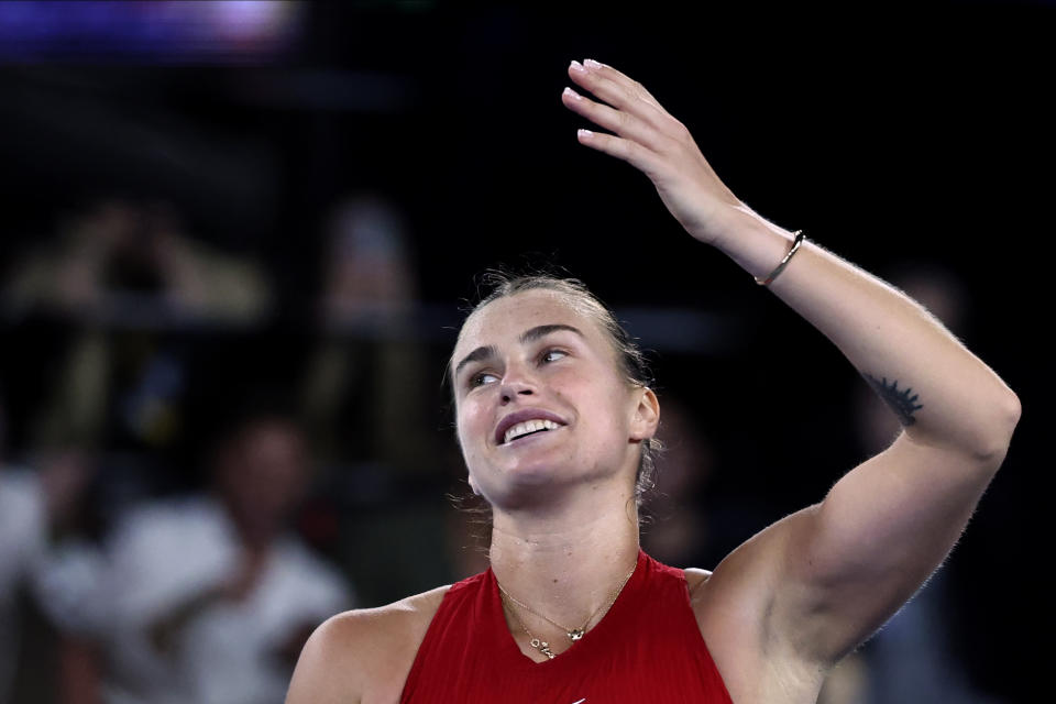 Aryna Sabalenka of Belarus celebrates after defeating Coco Gauff of the U.S. in their semifinal match at the Australian Open tennis championships at Melbourne Park, Melbourne, Australia, Thursday, Jan. 25, 2024.(AP Photo/Asanka Brendon Ratnayake)