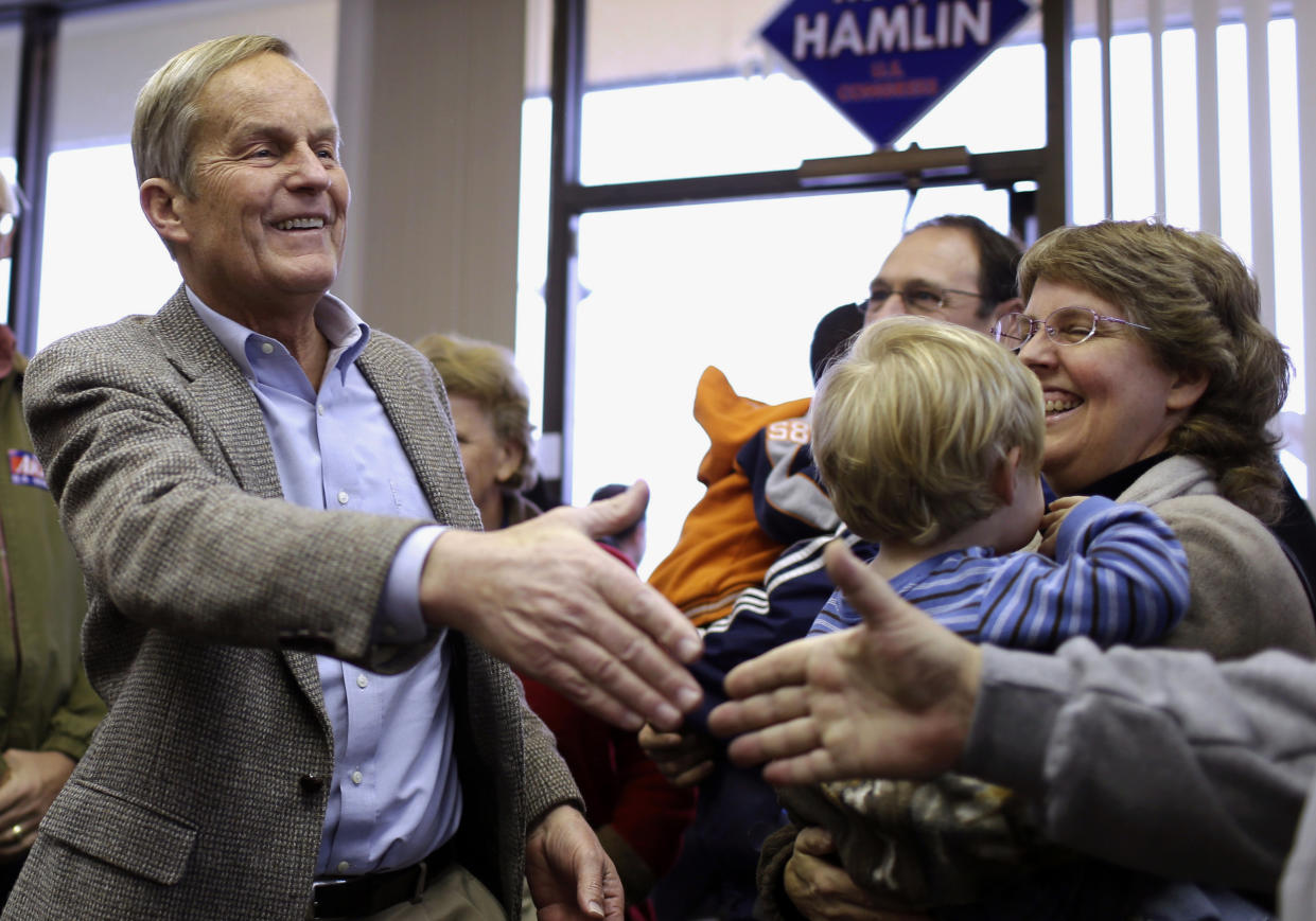 FILE - In this Nov. 5, 2012, file photo, Todd Akin, then a Missouri Republican Senate candidate, campaigns in Florissant, Mo. Akin, whose "legitimate rape" comments during the 2012 U.S. Senate campaign were roundly criticized has died. He was 74. (AP Photo/Jeff Roberson, File)