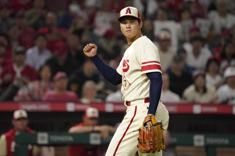 Los Angeles Angels starting pitcher Shohei Ohtani celebrates as Oakland Athletics' Nick Allen is thrown out at first to end the sixth inning of a baseball game Thursday, Sept. 29, 2022, in Anaheim, Calif. (AP Photo/Mark J. Terrill)