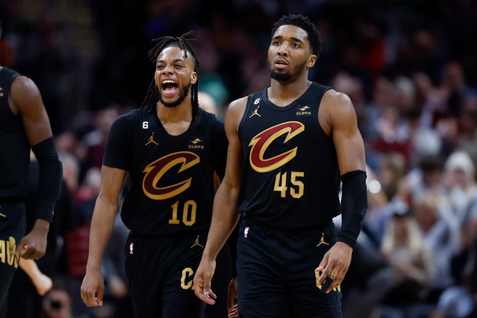 Cleveland Cavaliers guard Darius Garland (10) celebrates with guard Donovan Mitchell (45) during the second half of an NBA basketball game against the Boston Celtics, Monday, March 6, 2023, in Cleveland. (AP Photo/Ron Schwane)