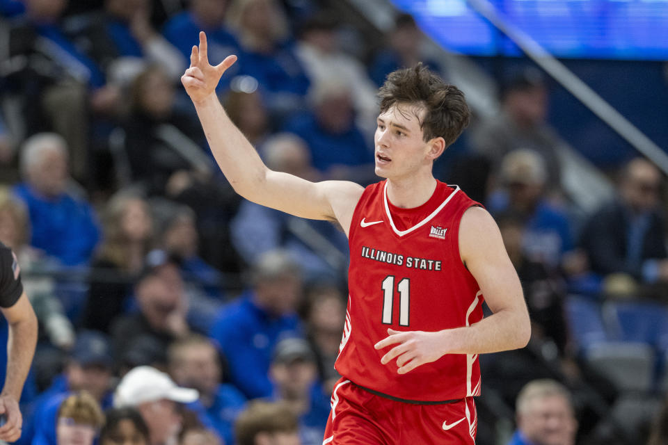 Illinois State guard Johnny Kinziger (11) gestures after scoring a 3-point basket against Indiana State during the second half of an NCAA college basketball game Tuesday, Feb. 13, 2024, in Terre Haute, Ind. (AP Photo/Doug McSchooler)