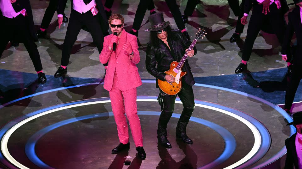 (From left) Ryan Gosling and Slash performing 'I'm Just Ken' from the 'Barbie' movie at the 2024 Oscars in Hollywood. - Patrick T. Fallon/AFP/Getty Images