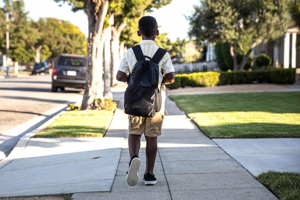 <p>Getty</p> A stock photo of a young little boy walking to school in the morning in Santa Monica, California.