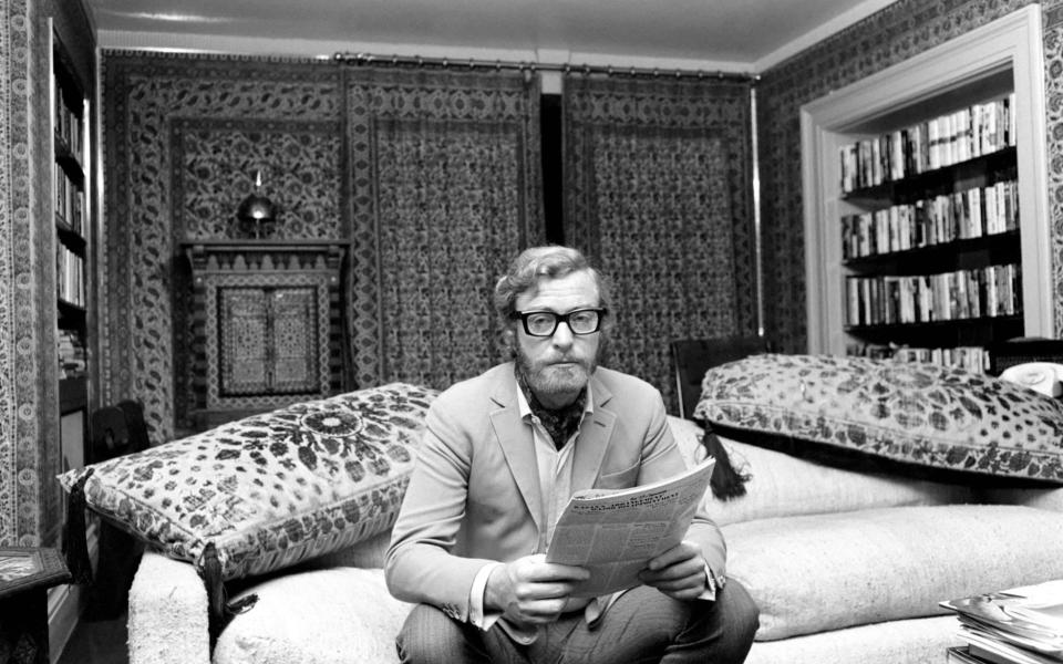 Actor Michael Caine pictured at his home in Grosvenor Square, also pictured is girlfriend Minda Feliciano from the Philippines. November 1969 Z11244-006 (Photo by Mirrorpix/Mirrorpix via Getty Images)  - Getty