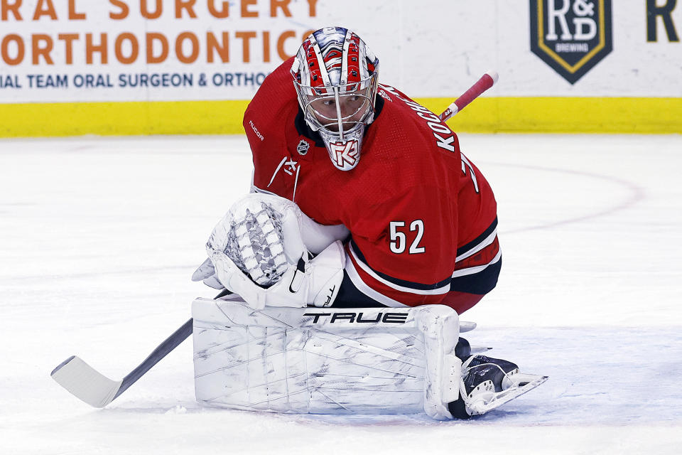 Carolina Hurricanes goaltender Pyotr Kochetkov watches the puck during the first period of the team's NHL hockey game against the Vancouver Canucks in Raleigh, N.C., Tuesday, Feb. 6, 2024. (AP Photo/Karl B DeBlaker)