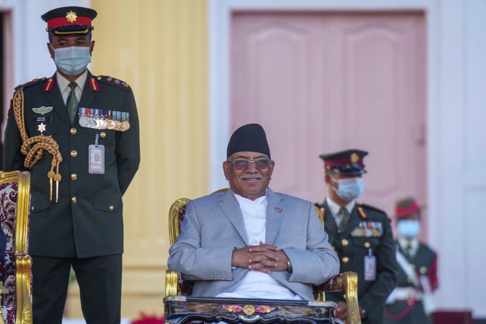 Nepal’s newly appointed prime minister Pushpa Kamal Dahal smiles after he was sworn in by President Bidhya Devi Bhandari at the President House in in Kathmandu, Nepal, Monday, Dec. 26, 2022. Dahal has appointed three deputies and four other ministers in the Cabinet that is expected to be expanded in the next few days to accommodate more members from the seven parties in the new coalition government. (AP Photo/Niranjan Shrestha)