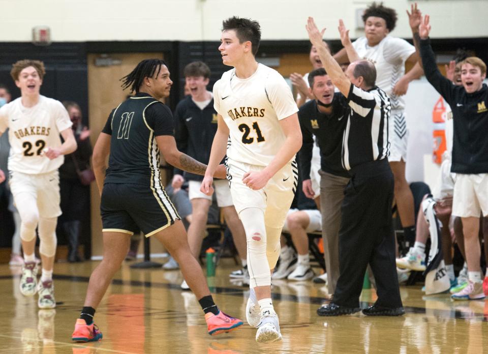 Moorestown's David Gheysens, center, reacts after hitting a 3-pointer during the 4th quarter of the boys basketball game between Moorestown and Burlington Township played at Moorestown High School on Friday, January 28, 2022.  Moorestown defeated Burlington Township, 47-46.