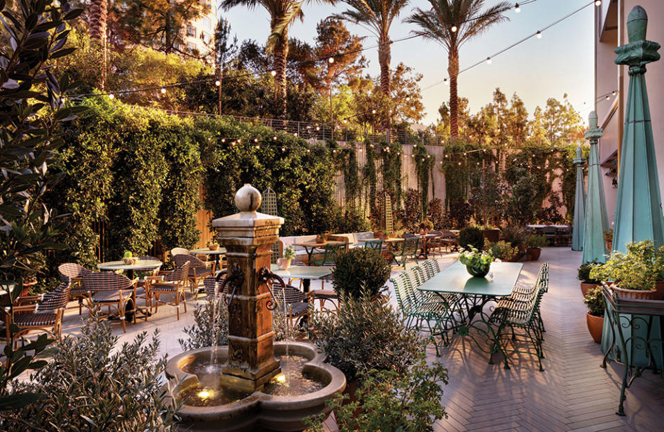 The outdoor dining area at Lumière, where dishes include steak frites, onion soup and seafood towers. - Credit: Courtesy Of Fairmont Century Plaza