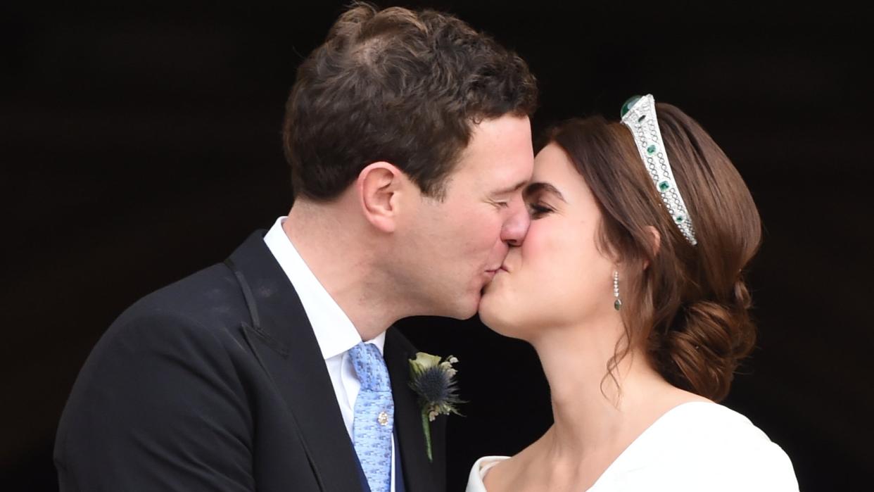  Princess Eugenie’s wedding tribute explained. Seen here Princess Eugenie and Jack Brooksbank kiss after their wedding ceremony. 