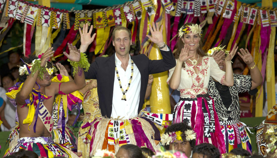 <p>Before they had children, they enjoyed a royal tour to Tuvalu, here dancing with women at the Vaiku Falekaupule for an entertainment programme. (Arthur Edwards)</p> 