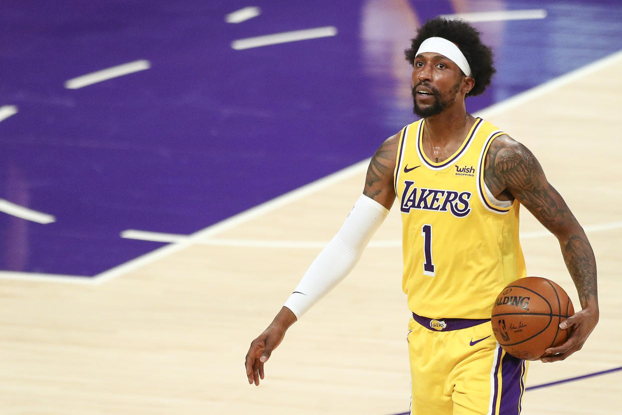 LOS ANGELES, CALIFORNIA - FEBRUARY 20: Kentavious Caldwell-Pope #1 of the Los Angeles Lakers looks on during the game against the Miami Heat at Staples Center on February 20, 2021 in Los Angeles, California. NOTE TO USER: User expressly acknowledges and agrees that, by downloading and or using this photograph, User is consenting to the terms and conditions of the Getty Images License Agreement. (Photo by Meg Oliphant/Getty Images)