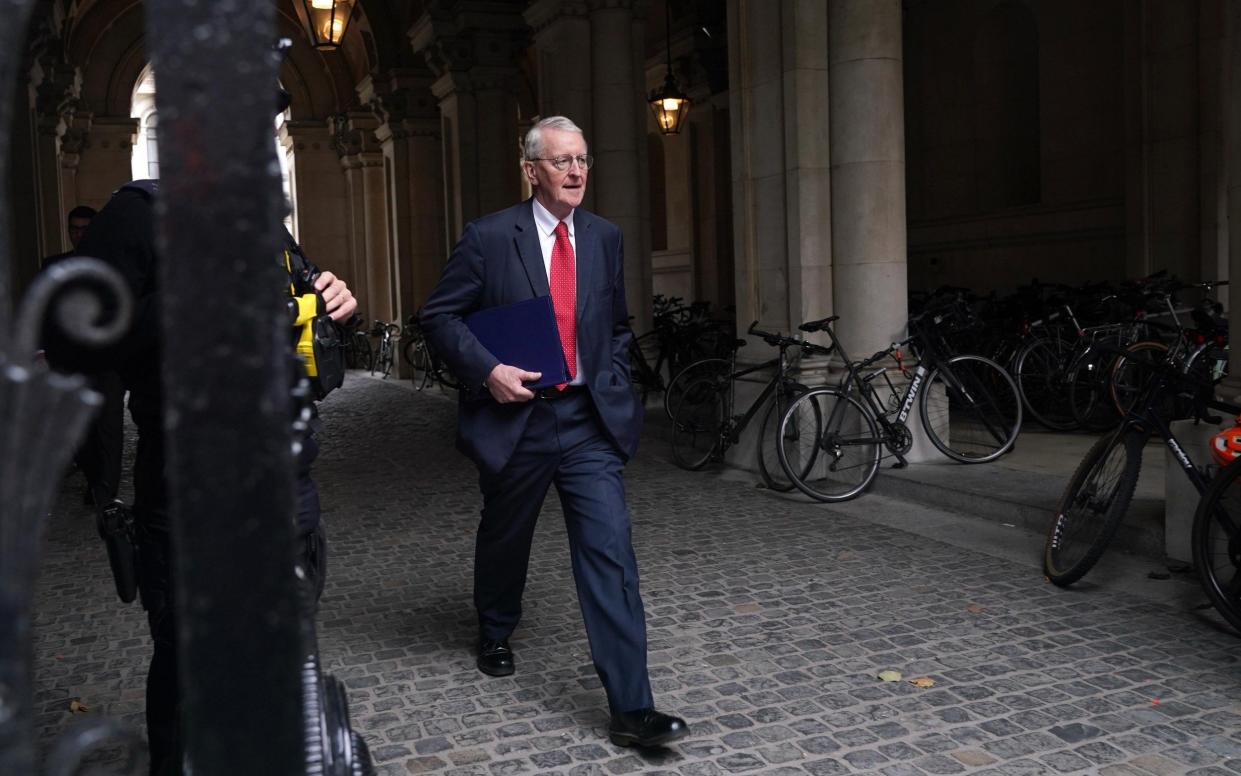 Hilary Benn, the Northern Ireland Secretary, arrives in Downing Street this morning to attend a meeting of the Cabinet