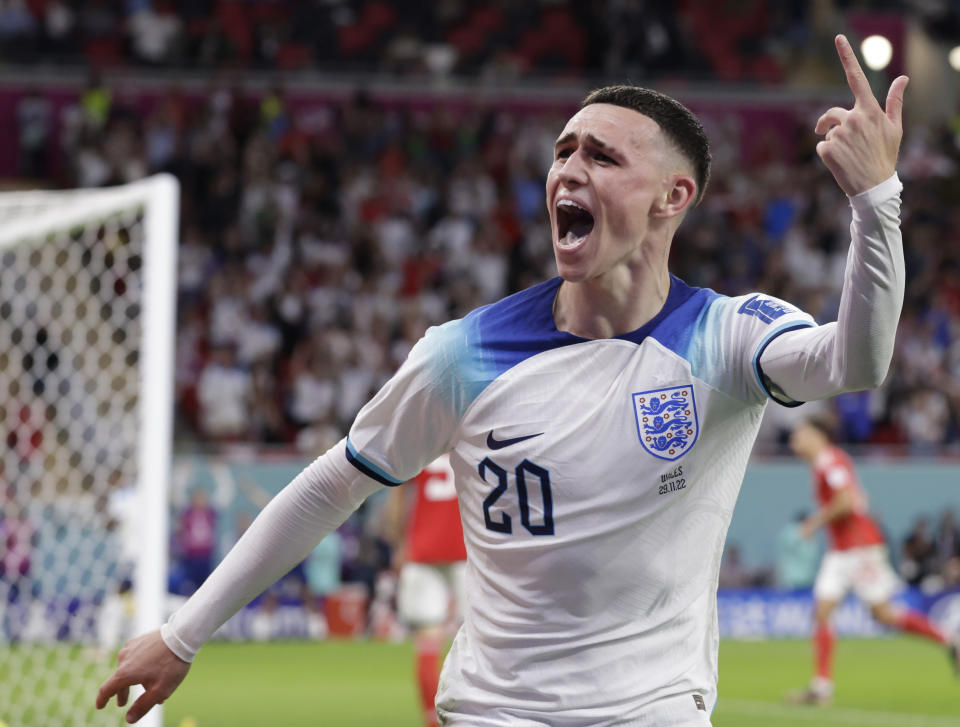 DOHA, QATAR - NOVEMBER 29: Phil Foden of England celebrtates goal during the FIFA World Cup Qatar 2022 Group B match between Wales and England at Al Janoub Stadium on November 29, 2022 in Doha, Qatar. (Photo by Richard Sellers/Getty Images)