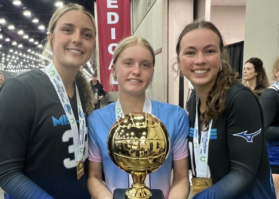 Bedford's Victoria Gray (left) and Mckenna Payne and Jessica Costlow of St. Mary Catholic Central were part of the MiElite Volleyball Team that won the 17-Open JVA World Volleyball Classic Sunday.