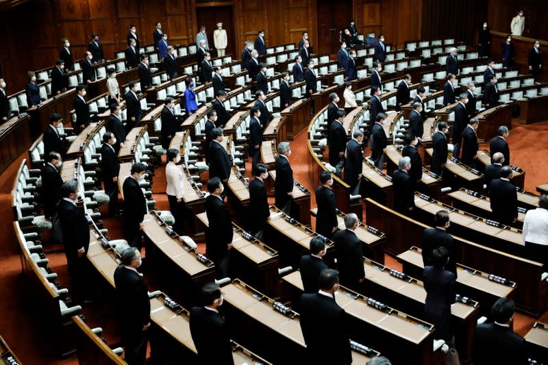 Lawmakers practice social distancing during the opening of an extraordinary session of parliament, in Tokyo