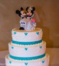 <div class="caption-credit"> Photo by: Shari Photography</div>The wedding cake was red velvet with lemon and dark chocolate and topped with Mickey and Minnie Mouse figurines.