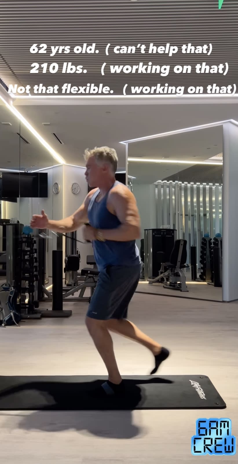 Sam Champion working out in gym