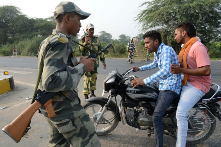 Indian Border Security Force personnel conduct security checks on the India-Pakistan Wagah Border on September 29, 2016