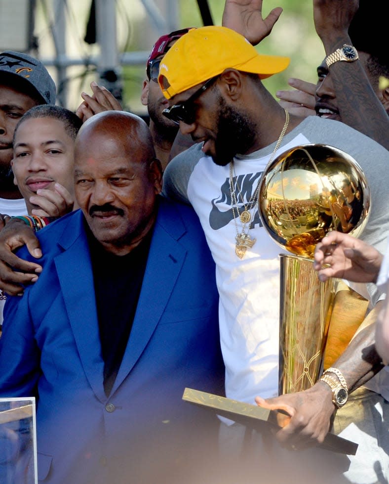 Former Cleveland Browns player Jim Brown, a member of the last team to win a major Cleveland championship, in 1964, stands with Cleveland Cavaliers forward <span class="caas-xray-inline-tooltip"><span class="caas-xray-inline caas-xray-entity caas-xray-pill rapid-nonanchor-lt" data-entity-id="LeBron_James" data-ylk="cid:LeBron_James;pos:2;elmt:wiki;sec:pill-inline-entity;elm:pill-inline-text;itc:1;cat:Athlete;" tabindex="0" aria-haspopup="dialog"><a href="https://search.yahoo.com/search?p=LeBron%20James" data-i13n="cid:LeBron_James;pos:2;elmt:wiki;sec:pill-inline-entity;elm:pill-inline-text;itc:1;cat:Athlete;" tabindex="-1" data-ylk="slk:LeBron James;cid:LeBron_James;pos:2;elmt:wiki;sec:pill-inline-entity;elm:pill-inline-text;itc:1;cat:Athlete;" class="link ">LeBron James</a></span></span> on June 22, 2016, during the Cleveland Cavaliers’ NBA championship celebration in downtown Cleveland. (Photo by Ken Blaze-USA TODAY Sports)