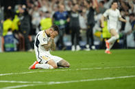 Real Madrid's Joselu reacts after winning the Champions League semifinal second leg soccer match between Real Madrid and Bayern Munich at the Santiago Bernabeu stadium in Madrid, Spain, Wednesday, May 8, 2024. Real Madrid won 2-1. (AP Photo/Jose Breton)