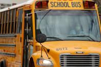 School bus drivers take part in caravan to demand proper funding for schools to support distant learning and a safe return to classes, in Los Angeles