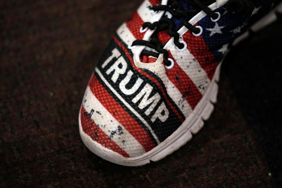 A supporter arrives to see former President Donald Trump during his visit with campaign volunteers at the Grimes Community Complex Park, Tuesday, July 18, 2023, in Des Moines, Iowa.