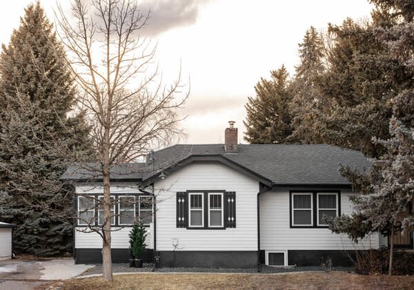 Located in the quaint suburb of Wheat Ridge, the one-story property is less than a 20-minute drive to Downtown Denver.  Soaring trees further enhances the home's overall sense of privacy.