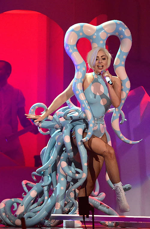 Gaga’s platinum hair is topped off with inflatable octopus arms while she performs on stage for her ARTPOP tour in Florida. Gotta love her dedication to marine creatures.