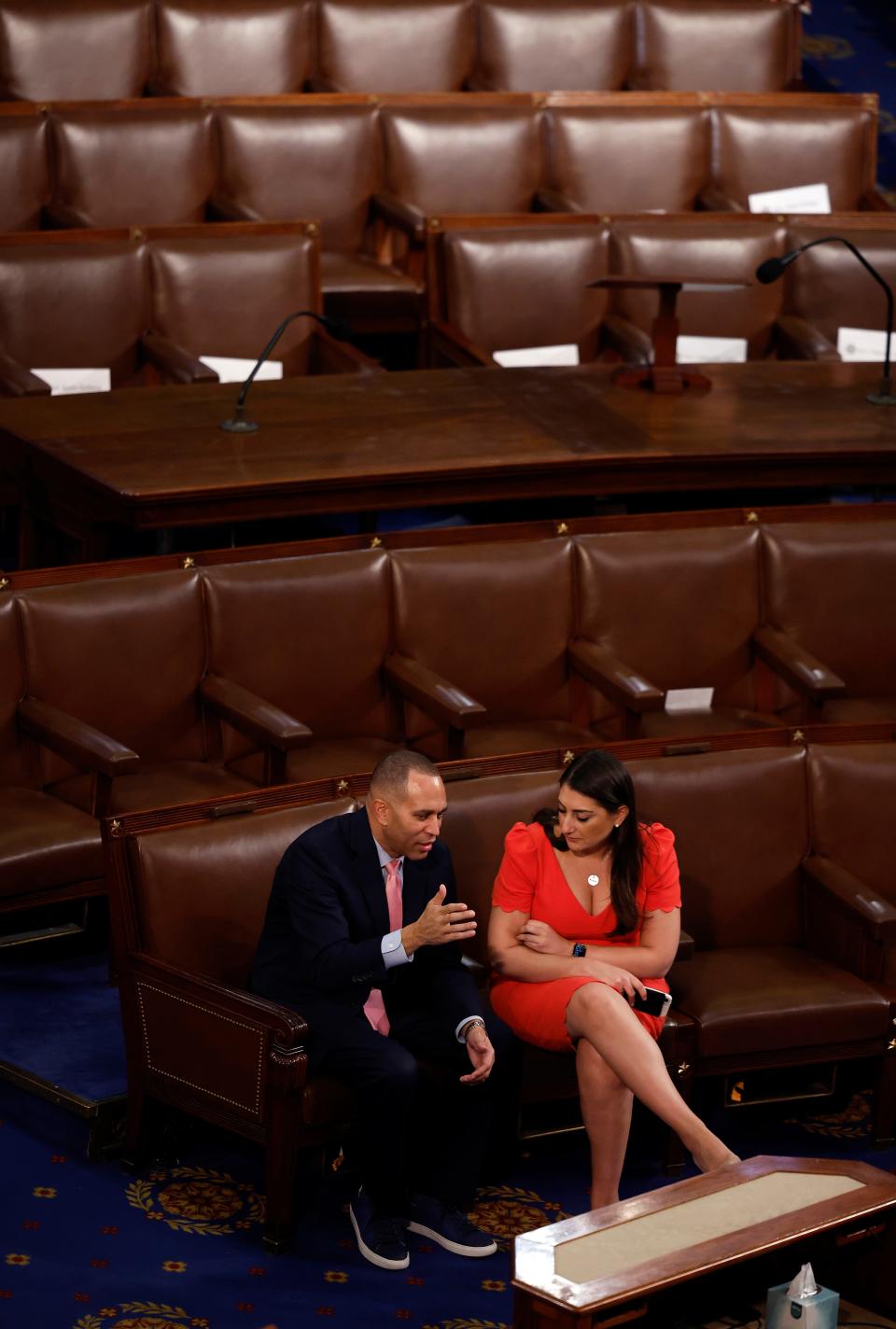 U.S. House Democratic Leader Hakeem Jeffries (D-NY) talks to Rep.-elect Sara Jacobs (D-CA) in the House Chamber during the third day of elections for Speaker of the House at the U.S. Capitol Building on Jan. 5, 2023, in Washington, DC. The House of Representatives is meeting to vote for the next Speaker after House Republican Leader Kevin McCarthy (R-CA) failed to earn more than 218 votes on several ballots, the first time in 100 years that the Speaker was not elected on the first ballot.