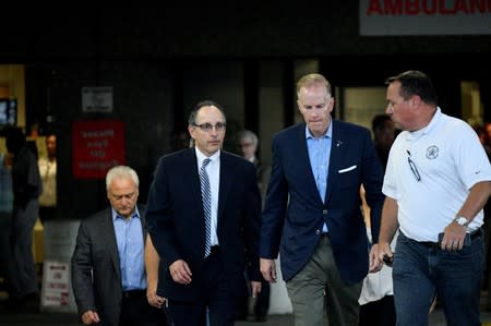 U.S. Attorney McSwain departs after visiting injured police officers in Philadelphia