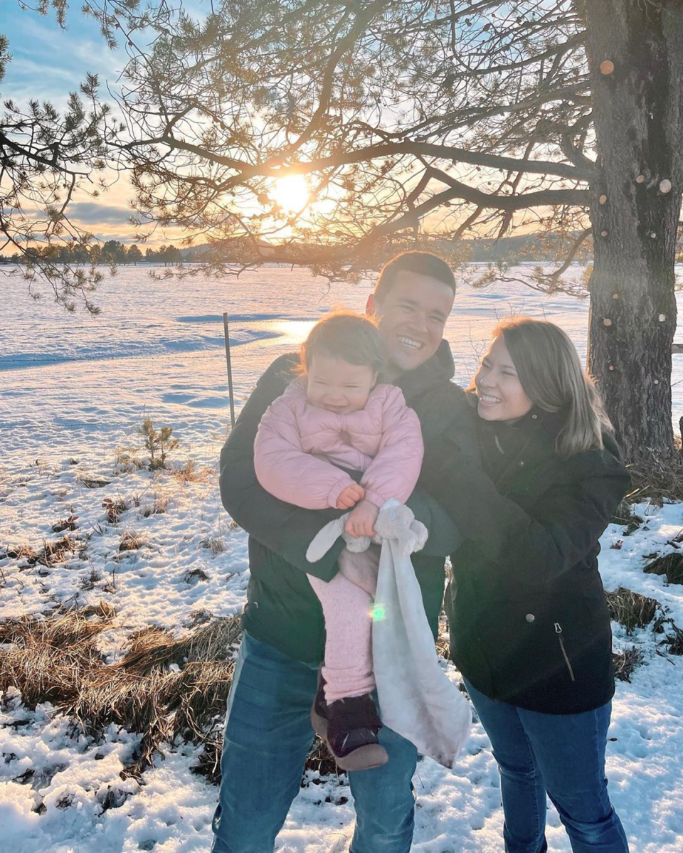 Bindi Irwin, Chandler Powell and Grace Warrior in the snow.