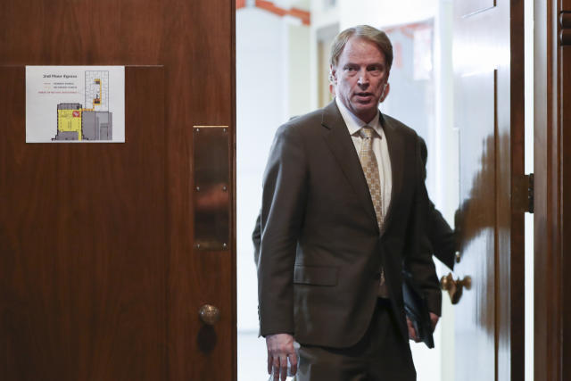 Senate Minority Leader Tim Knopp enters the Senate chambers at the Oregon State Capitol in Salem, Ore., Thursday, May 4, 2023. Four Republican senators and one Independent senator had unexcused absences, preventing a quorum for the second day. (AP Photo/Amanda Loman)