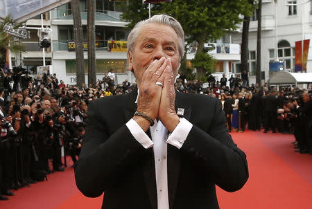 72nd Cannes Film Festival - Red Carpet Arrivals - Cannes, France, May 19, 2019. Alain Delon poses before receiving his honorary Palme d'Or Award. REUTERS/Stephane Mahe