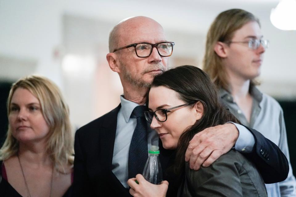 Screenwriter and film director Paul Haggis hugs his daughter, Lauren, before court for a sexual assault civil lawsuit, Wednesday, Nov. 2, 2022, in New York. (AP Photo/Julia Nikhinson)