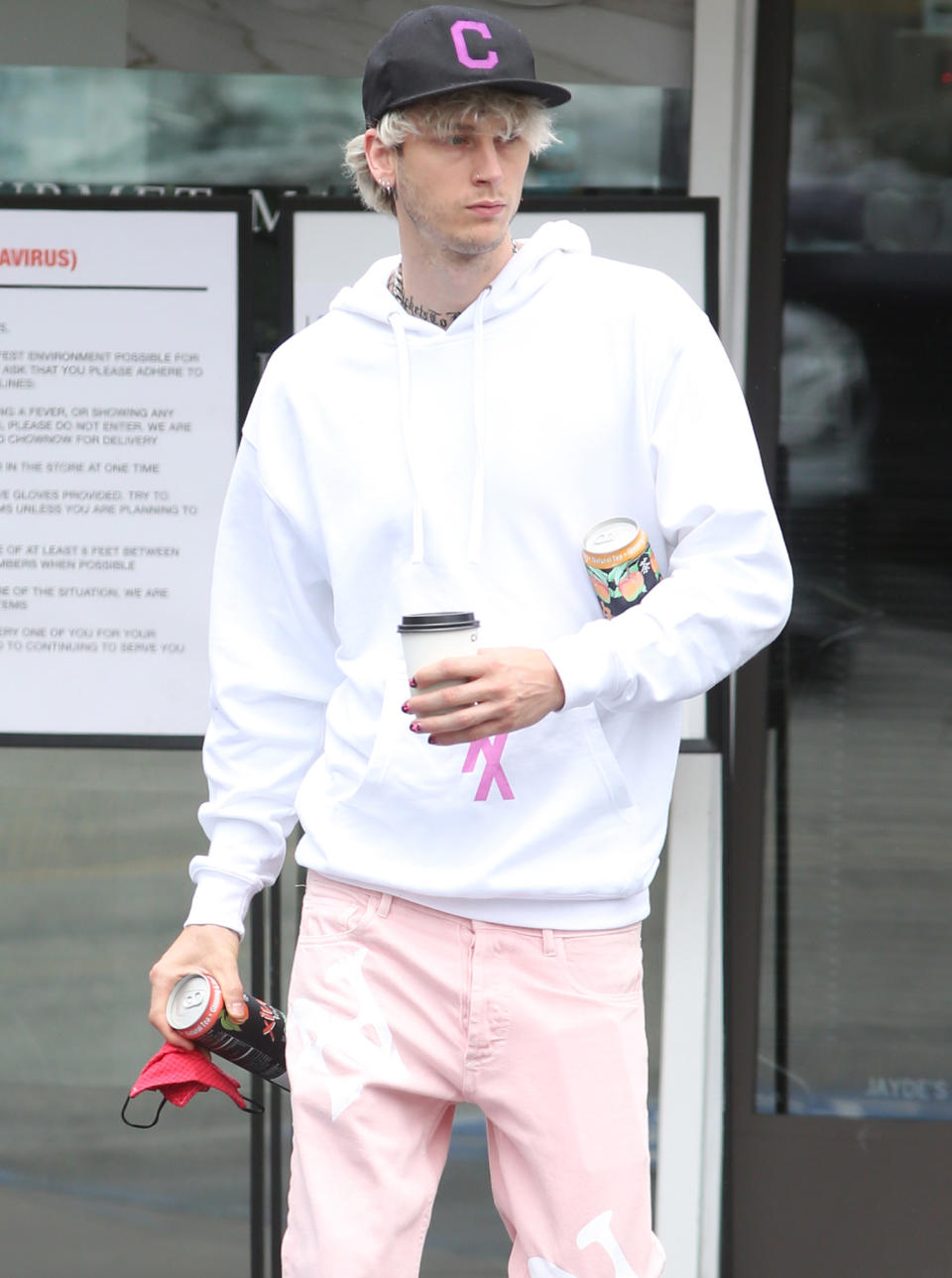 <p>Machine Gun Kelly steps out solo on Monday for a coffee run in Bel Air, California, after being spotted with Megan Fox over the weekend. </p>