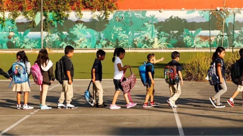 LOS ANGELES, CA â€" AUGUST 14, 2018: Students form lines on the playground as they prepare to go to their classroom on the first day at Dolores Huerta Elementary School in Los Angeles which has Kindergarten through 5th grade as LAUSD begins the school year Tuesday, August 14, 2018. (Al Seib / Los Angeles Times)