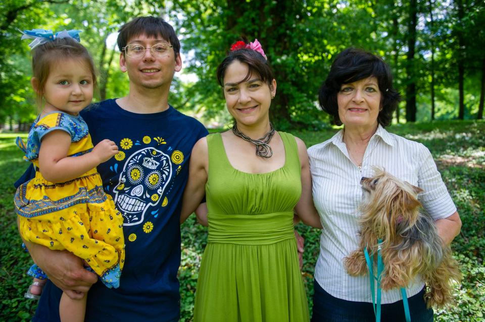 From left to right; Zehra Bolt, Matthew Bolt, vocalist Ayca Yayman, and Suzanne Yayman pose for a photo during the Music at the Market concert in Walter Hardy Park on Sunday, June 5, 2022. Performed by Knoxville Symphony Orchestra musicians, the concert was held to raise funds for the Austin-East Foundation. 