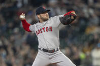 Boston Red Sox starter Kutter Crawford delivers a pitch during the first inning of the team's baseball game against the Seattle Mariners, Saturday, March 30, 2024, in Seattle. (AP Photo/Stephen Brashear)