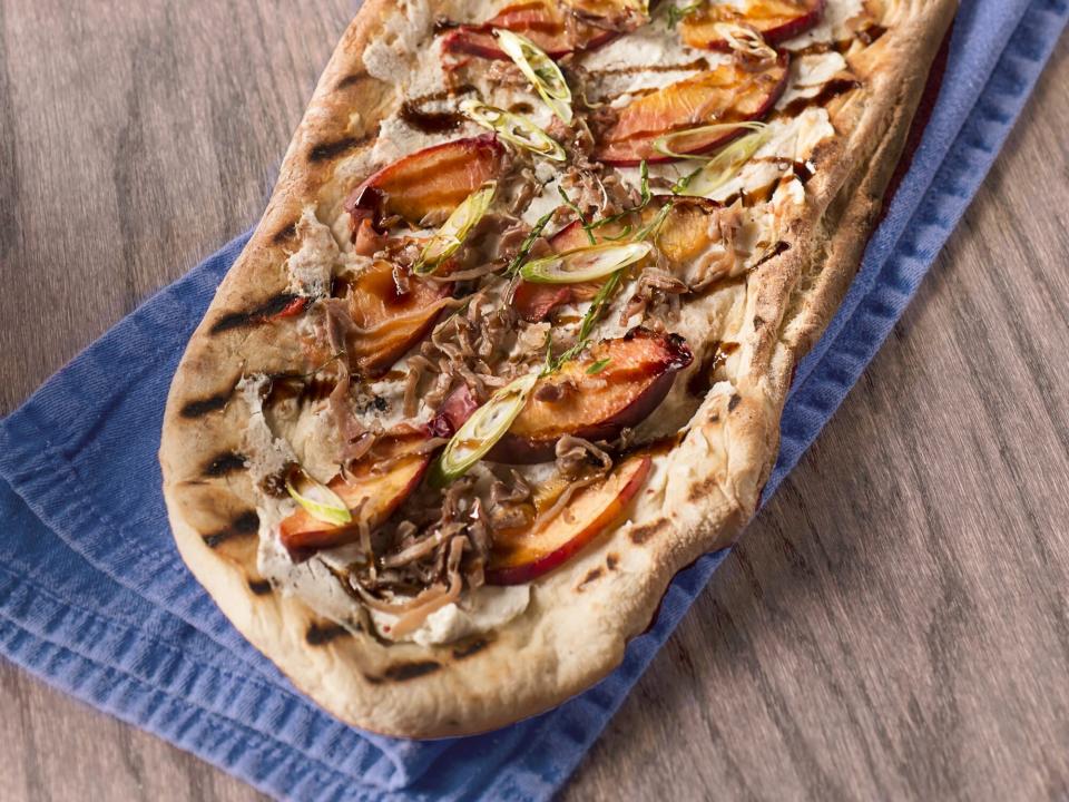 Pizza with grilled peaches