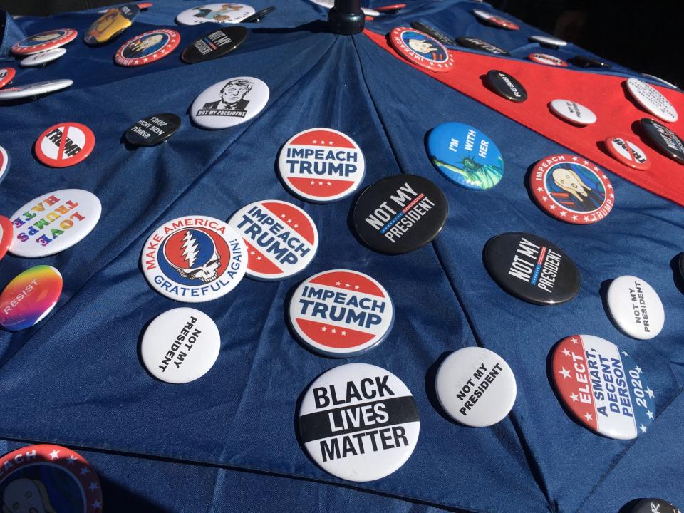 <p>Pins are seen during the “Not My President’s Day” rally on Central Park West in New York City on Feb. 20, 2017. (Gordon Donovan/Yahoo News) </p>