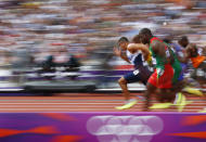 Britain's Adam Gemili leads during heat 5 of the round 1 men's 100m heats at the London 2012 Olympic Games at the Olympic Stadium August 4, 2012. Gemili finished second in his heat. REUTERS/Kai Pfaffenbach (BRITAIN - Tags: OLYMPICS SPORT ATHLETICS TPX IMAGES OF THE DAY) 