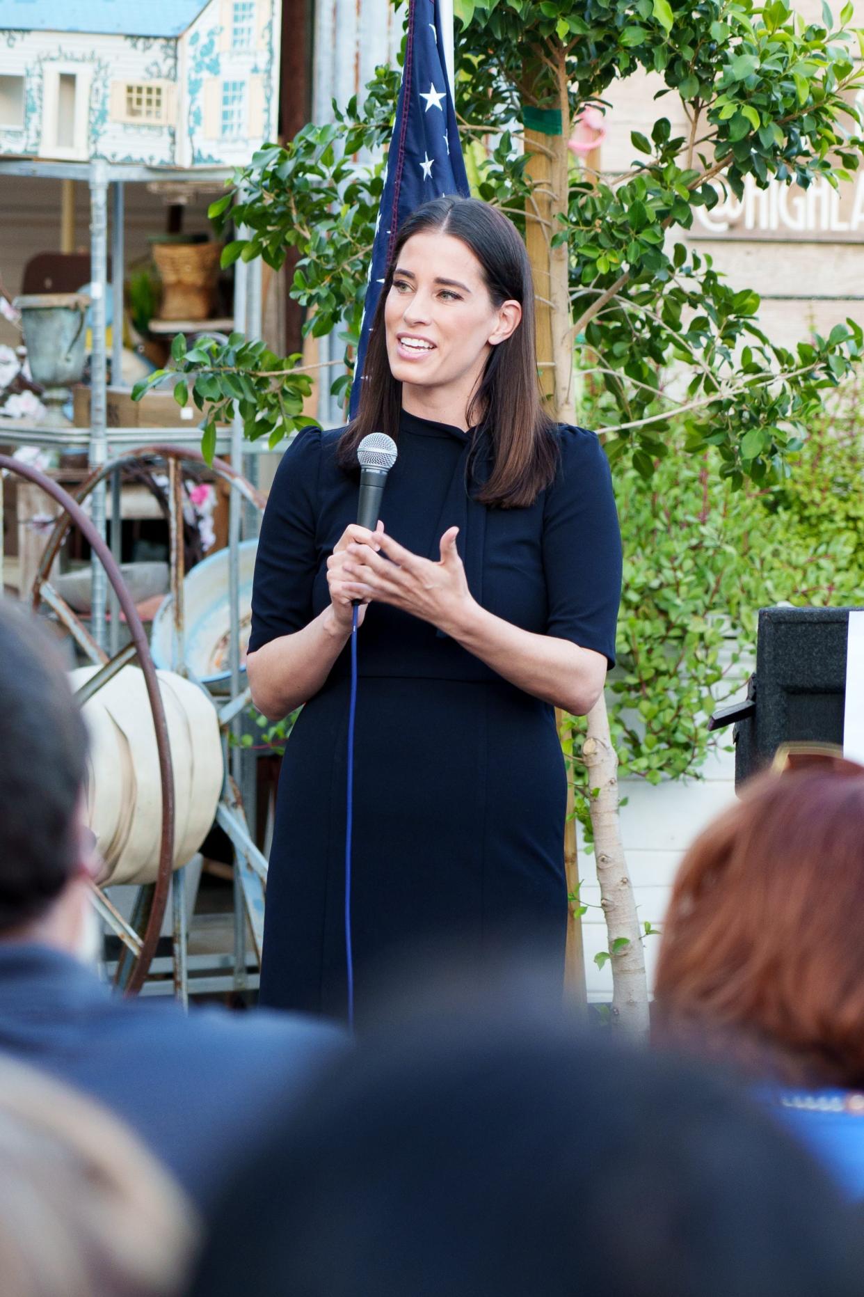 Former One America News Network anchor Christina Bobb speaks at a Blake Masters election integrity event where she was meant to moderate a debate between Masters and Arizona Attorney General Mark Brnovich at American Way Smokehouse on April 30, 2022, in Chandler. Brnovich did not attend the event.